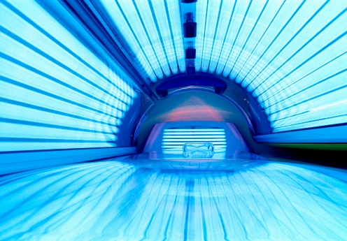 Illuminated tanning bed