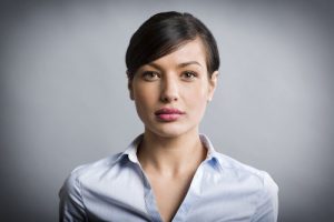 'woman thinking about oral cancer'