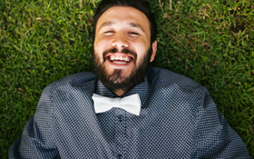 Man who avoided jaw bone loss thanks to socket preservation following his tooth extraction in Cupertino.